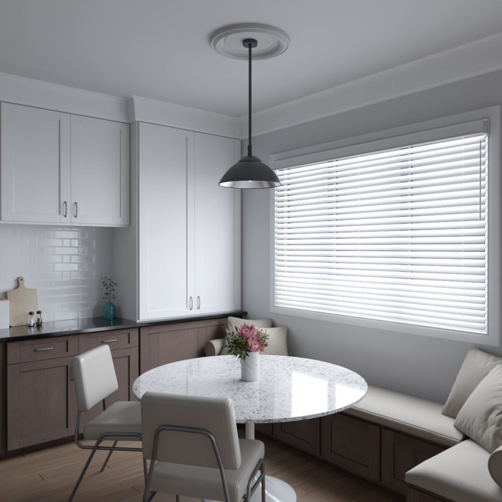 A Modern white room with a grey hanging light with a grey ceiling medallion complementing the light and the room.